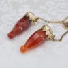 Antique 14K Gold Carved Carnelian Knitting Needle Guard Caps Necklace 19", view 1