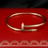 Cartier 18k Yellow Gold Diamond Nail Bracelet Size 18 Juste un Clou Pouch, view 1