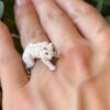 Vintage 18k Panthere De Cartier Diamond Emerald Onyx Walking Panther Ring shown worn, view 3