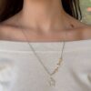 Sonja Picard 14k Gold Sterling Diamond Destiny Star Necklace 23" shown worn