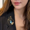 Jean Mahie Blue Topaz Pendant Brooch 9k Yellow Gold shown worn