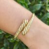 Tiffany & Co. 14k Yellow Gold Bypass Bangle Bracelet 6.5" Hinge Retired shown worn