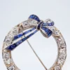 Antique Diamond and Sapphire Wreath Bow Brooch, 14k White Gold, view 1