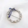 Antique Diamond and Sapphire Wreath Bow Brooch, 14k White Gold, view 2